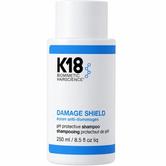 K18 Damage Shield Shampoo witte pompfles met blauwe streep, pakshot