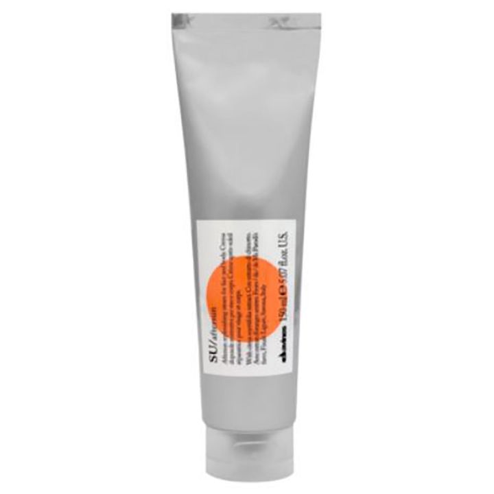 Davines Aftersun pakshot van zilvergrijze tube met wit etiket en oranje cirkel op witte achtergrond