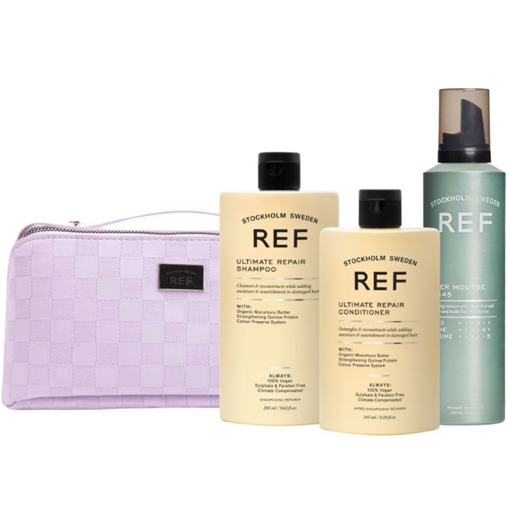 REF Beauty Ultimate Repair Giftbag met lila toilettas, shampoo, conditioner en mousseflacon